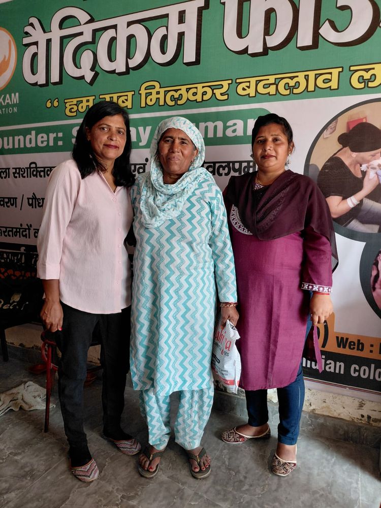 Vaidikam Foundation coordinators with a beneficiary